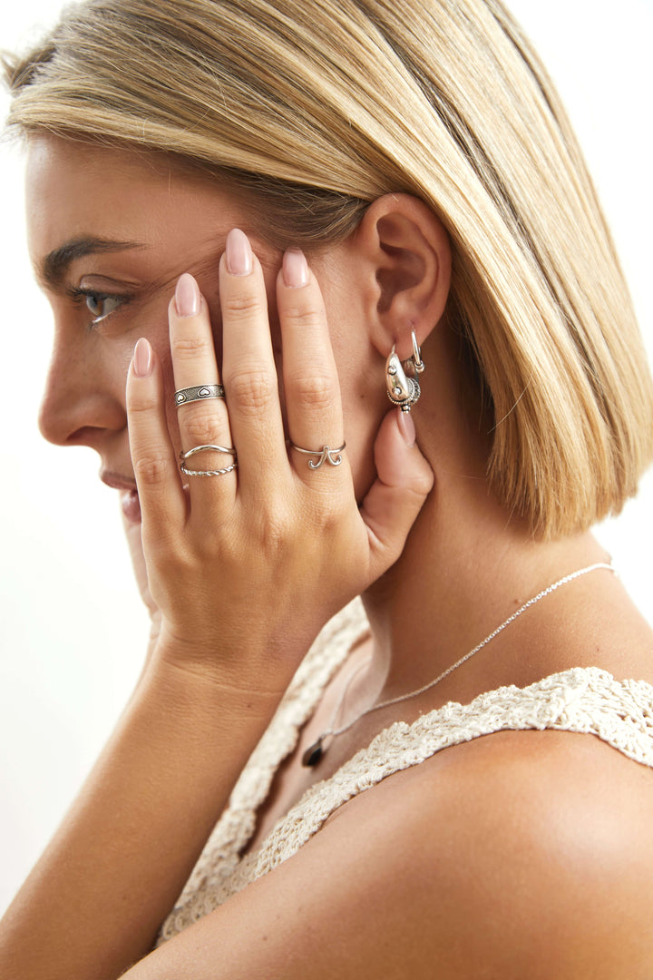 anillo plateado ajustable acero dobre 