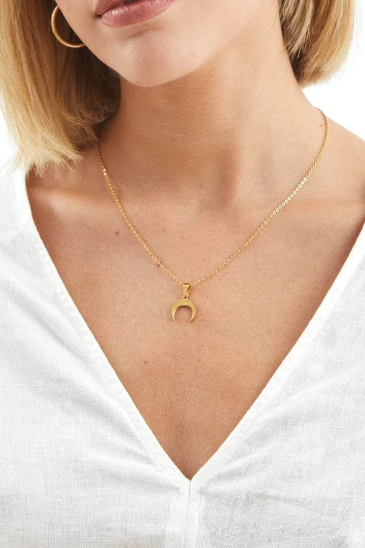 collar dorado luna acero